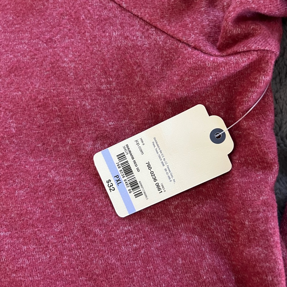 Brand new with tags womens soft long sleeved shirt/light sweater.